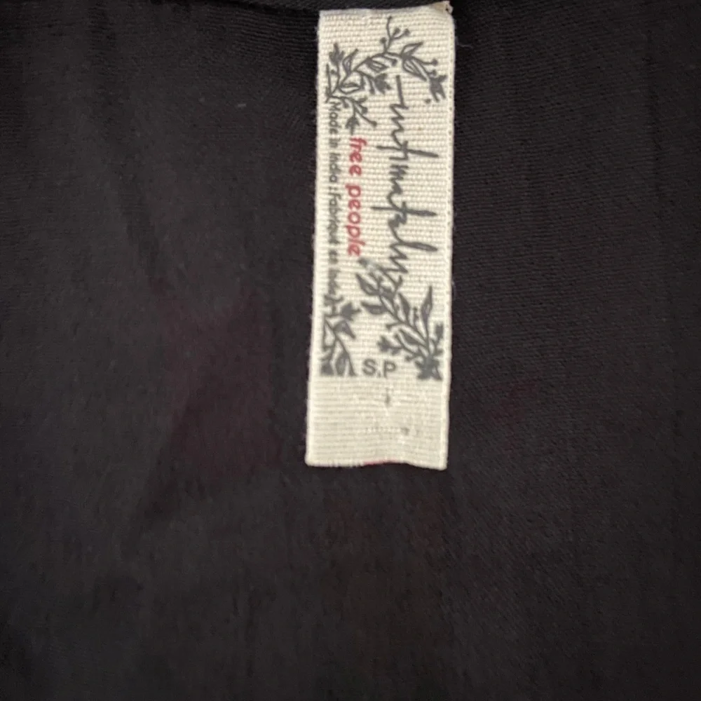 Free People Cleo Bodysuit Tie Cutout  Black V Neck Short Sleeve Ruffle S NWOT